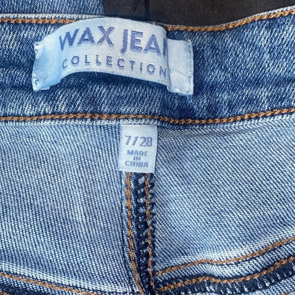 Distressed Blue Jeans